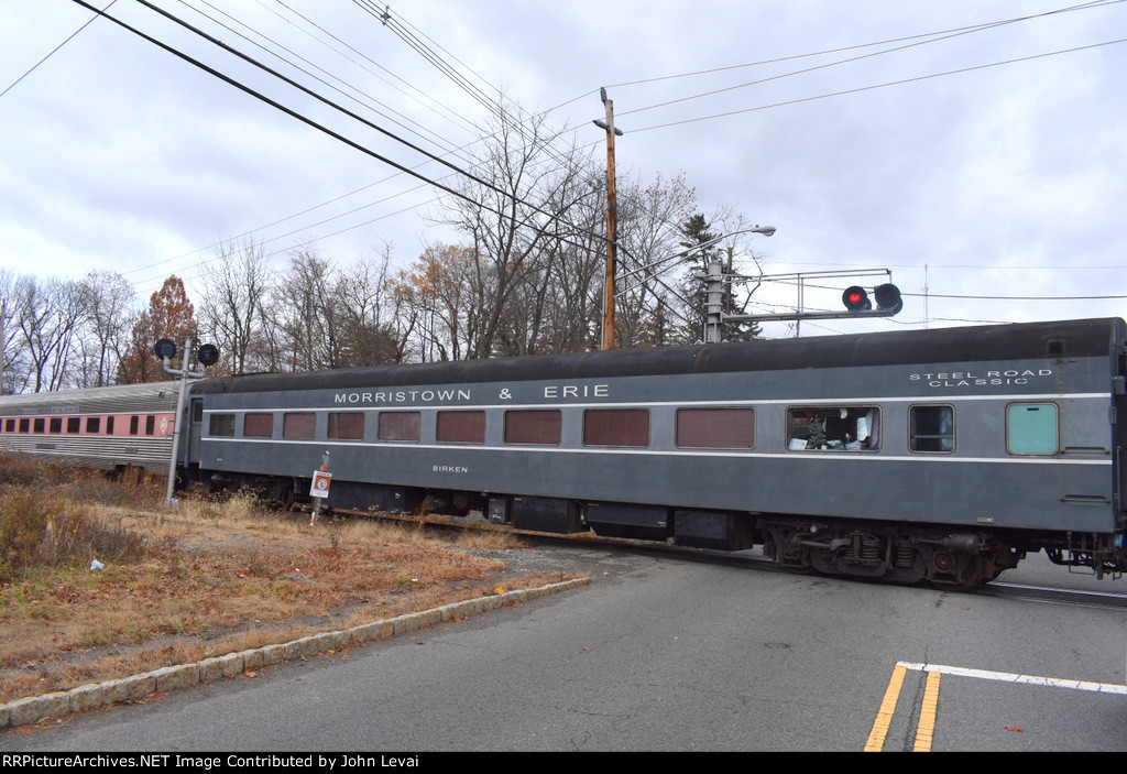 Morristown & Erie Birken Class Car on the Polar Express as it crosses Deforest Avenue